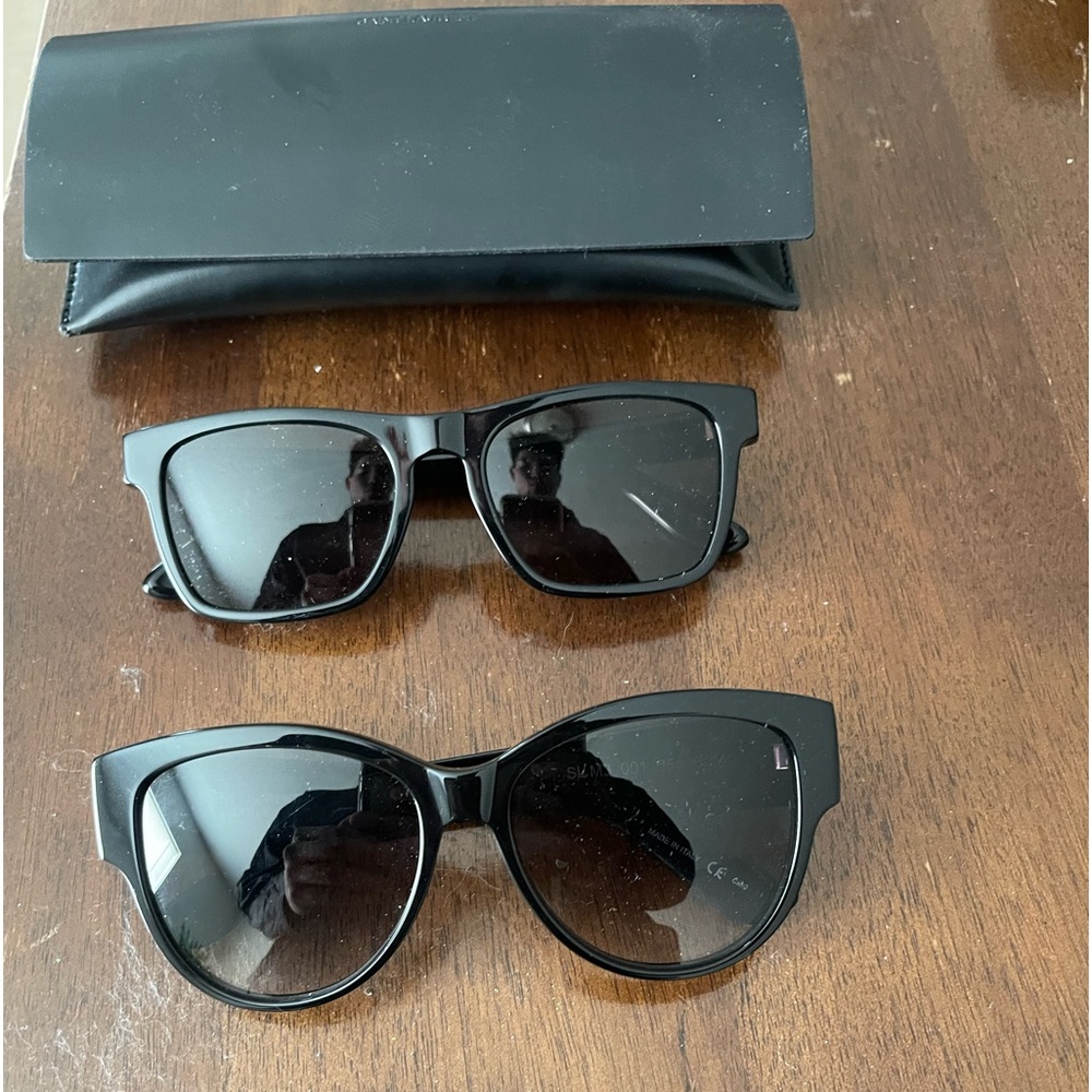 YSL black sunglasses new with Cade and lens wipe 180$ each or 300$ together